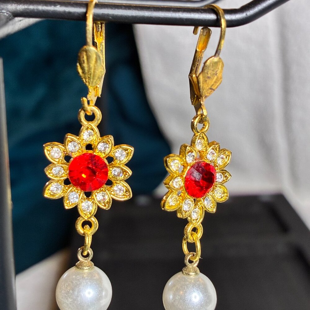 Gold accent flower earrings with red rhinestone and dangling pearl